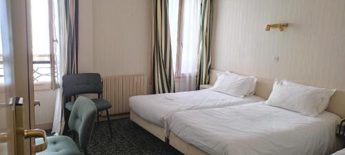 Habitación Doble - 2 camas del hotel Grand Hotel du Havre. Foto 3