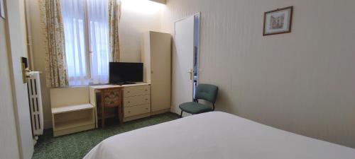 Habitaciones Contiguas del hotel Grand Hotel du Havre. Foto 1