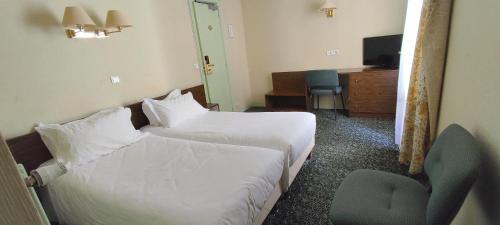 Habitaciones Contiguas del hotel Grand Hotel du Havre. Foto 3