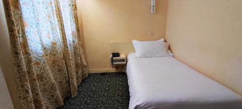 Habitación Individual del hotel Grand Hotel du Havre. Foto 2