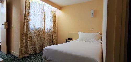 Habitación Individual del hotel Grand Hotel du Havre. Foto 4