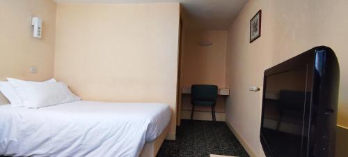 Habitación Individual del hotel Grand Hotel du Havre. Foto 5