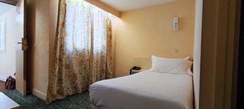 Habitación Individual del hotel Grand Hotel du Havre. Foto 8