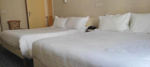 Habitación cuádruple del hotel Grand Hotel du Havre