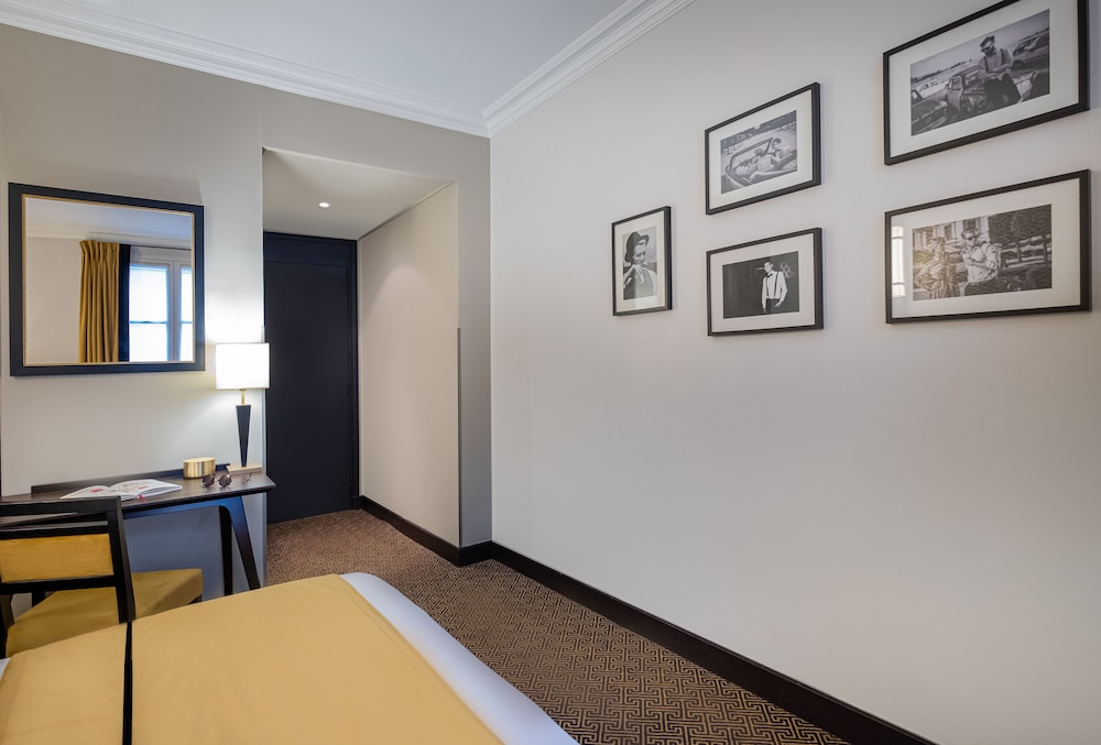Habitación clásica doble del hotel Hôtel Le Marquis by Inwood Hotels. Foto 1