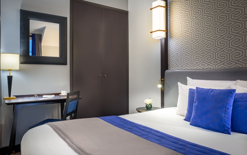 Habitación, habitaciones comunicadas del hotel Hôtel Le Marquis by Inwood Hotels. Foto 1
