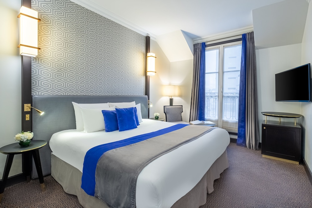 Habitación ejecutiva doble del hotel Hôtel Le Marquis by Inwood Hotels. Foto 3