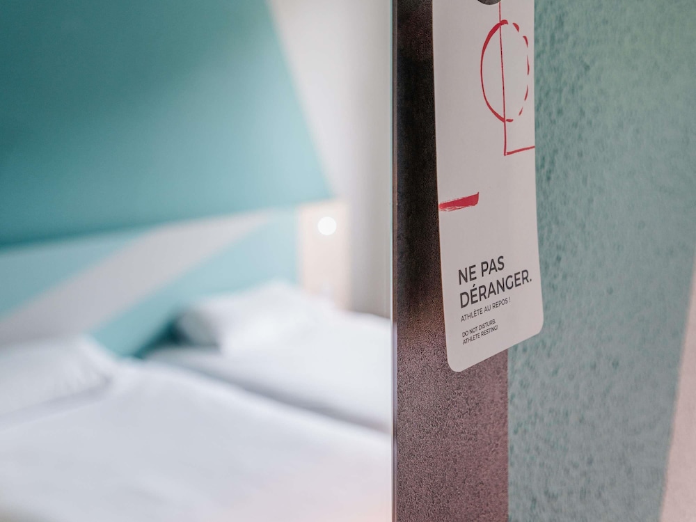 TWIN - Habitación con dos camas individuales del hotel Ibis Budget Rennes Route De Saint Malo. Foto 2