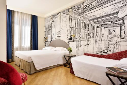 Habitación Triple Superior del hotel FH55 Grand Hotel Mediterraneo