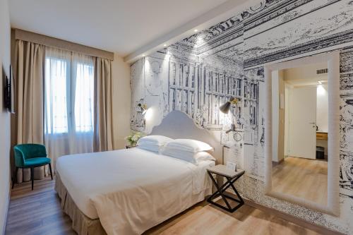 Habitación Triple Executive del hotel FH55 Grand Hotel Mediterraneo. Foto 2