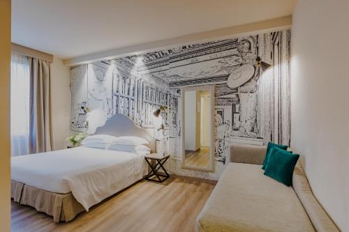 Habitación Triple Executive del hotel FH55 Grand Hotel Mediterraneo. Foto 3