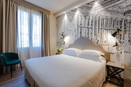 Habitación Triple Executive del hotel FH55 Grand Hotel Mediterraneo. Foto 4