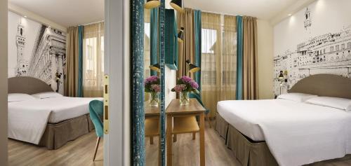 Habitación Familiar Superior del hotel FH55 Grand Hotel Mediterraneo. Foto 4