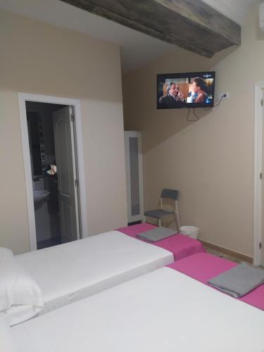 Habitación Cuádruple con baño privado del hotel Azahar. Foto 3