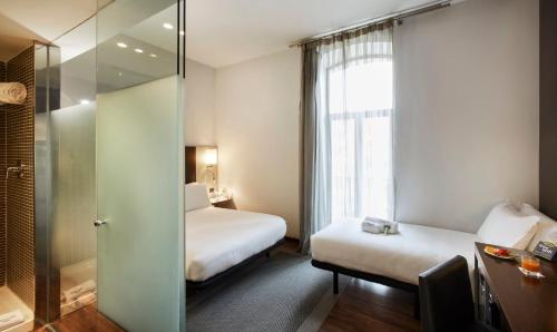 Habitación Familiar del hotel Sercotel Ciutat D'alcoi. Foto 1