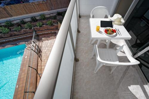 One Bedroom Apartment with Pool View del hotel Apartamentos Strelitzias. Foto 24