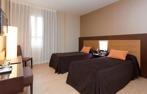 Habitación Doble - 1 o 2 camas del hotel Ciudad De Alcaniz. Foto 8