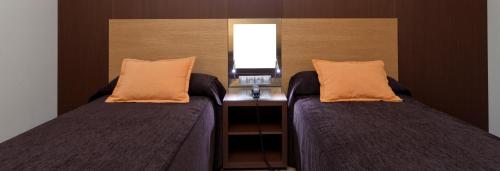 Habitación Doble - 1 o 2 camas del hotel Ciudad De Alcaniz. Foto 9
