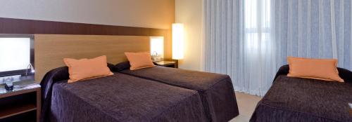 Habitación Triple del hotel Ciudad De Alcaniz. Foto 4