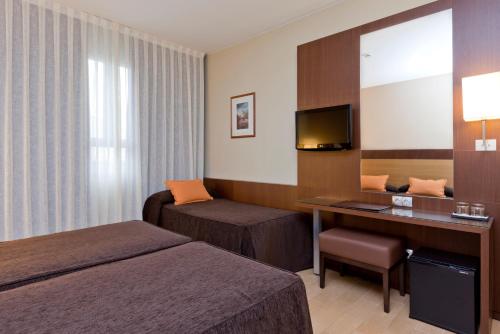 Habitación Triple del hotel Ciudad De Alcaniz. Foto 6