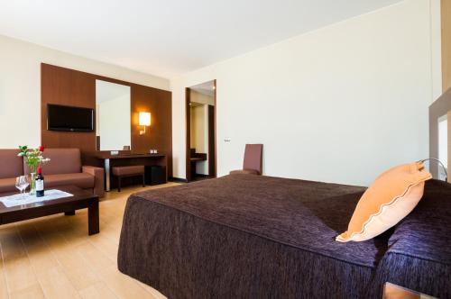 Habitación Deluxe del hotel Ciudad De Alcaniz. Foto 1