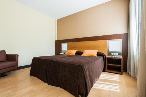 Habitación Deluxe del hotel Ciudad De Alcaniz. Foto 2