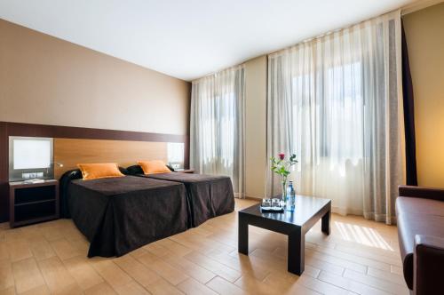 Habitación Deluxe del hotel Ciudad De Alcaniz. Foto 3