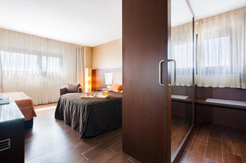 Habitación Deluxe del hotel Ciudad De Alcaniz. Foto 6
