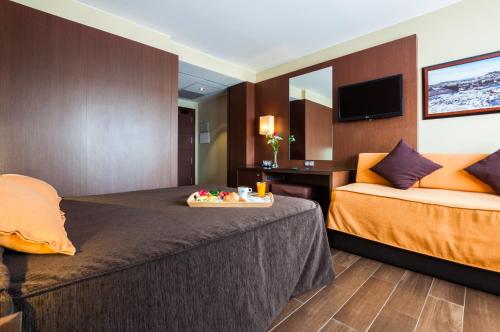Habitación Deluxe del hotel Ciudad De Alcaniz. Foto 7