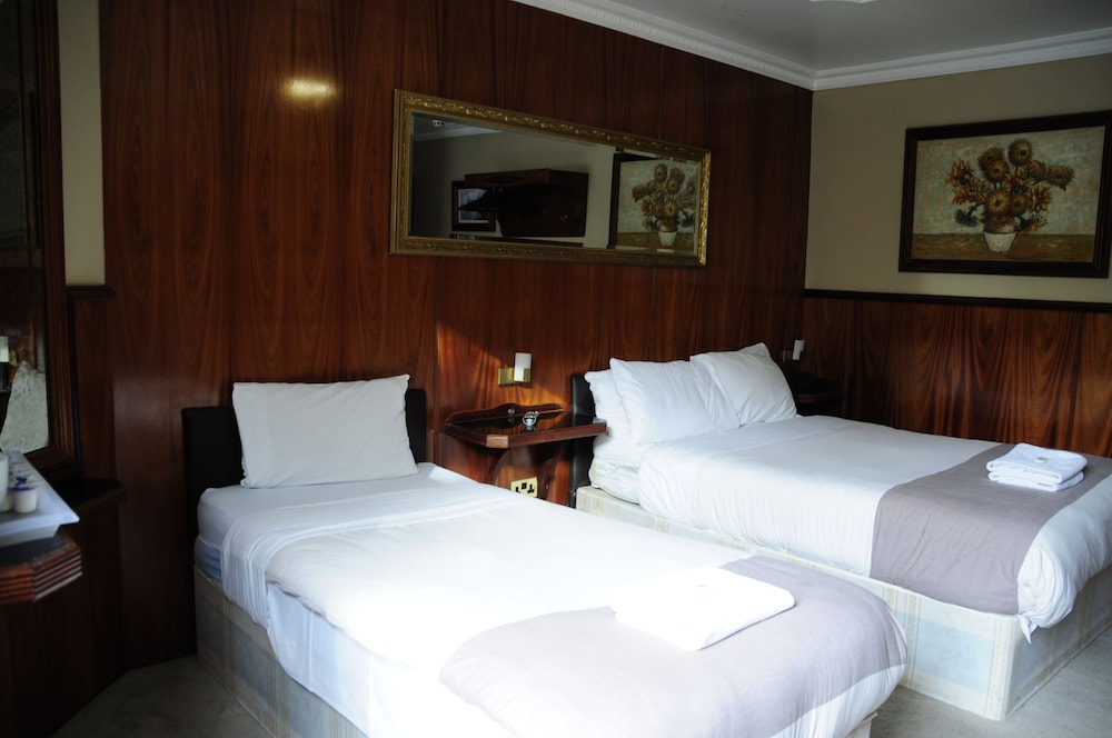 Habitación con 2 camas individuales del hotel Cricklewood Lodge