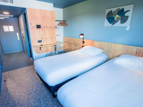 Habitación Pop con 2 camas individuales del hotel greet hotel Montpellier Aeroport Parc des Expos. Foto 8