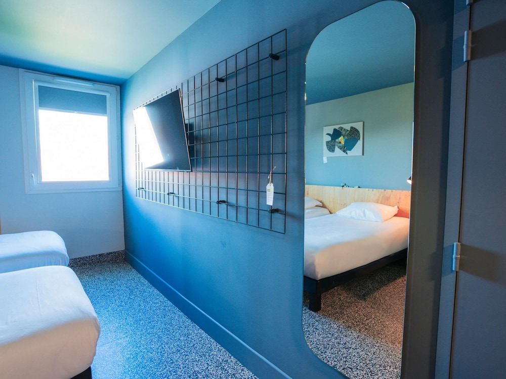 Habitación Little POP con 2 camas individuales del hotel greet hotel Montpellier Aeroport Parc des Expos. Foto 6