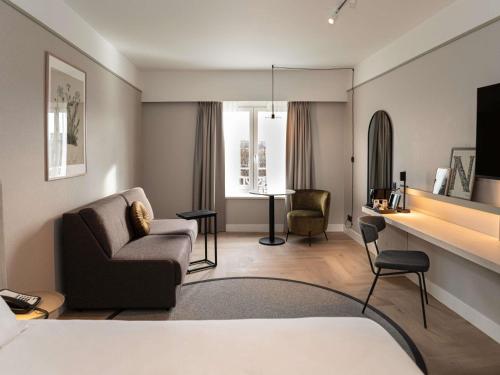 Habitación Superior con sofá - cama extragrande del hotel Mercure Liege City Centre. Foto 1