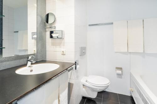 Habitación Triple Estándar del hotel Garner Hotel Maastricht. Foto 4