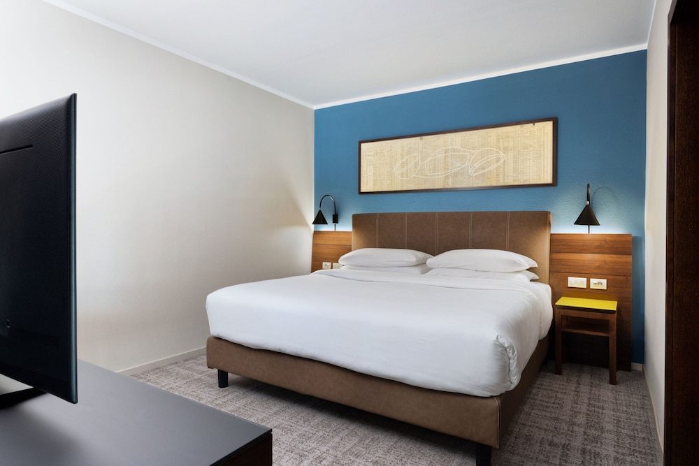 Suite ejecutiva, 1 cama de matrimonio grande del hotel Four Points By Sheraton Bolzano. Foto 1