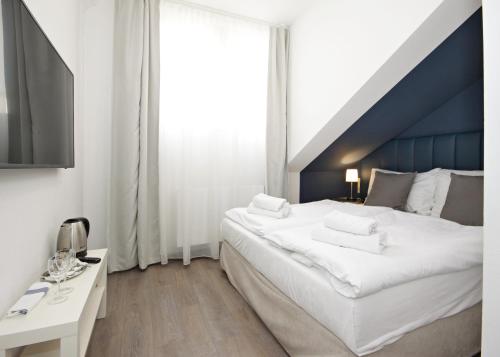 Habitación Doble del hotel Alveo Suites. Foto 11