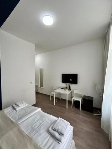 Habitación Doble del hotel Alveo Suites. Foto 21