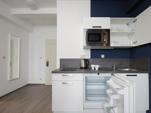 Junior suite 2 Camas individuales kitchenette del hotel Alveo Suites. Foto 10