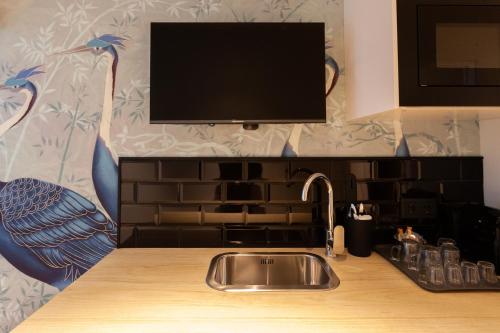 Habitación Triple Executive del hotel Welldone Sierpes Boutique. Foto 4
