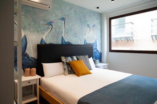 Habitación Triple Executive del hotel Welldone Sierpes Boutique. Foto 8