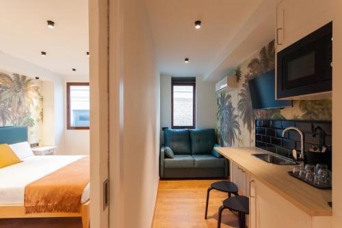 Habitación Triple Executive del hotel Welldone Sierpes Boutique. Foto 12