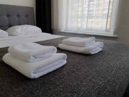 Habitación Triple Clásica del hotel Heye 130. Foto 1