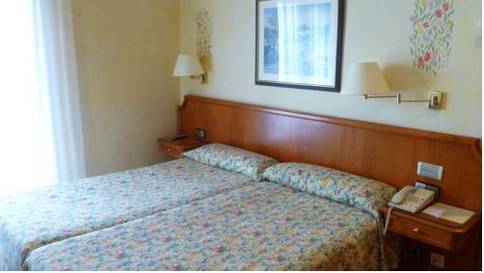 Habitación doble 2 camas del hotel Regencia Colon. Foto 1