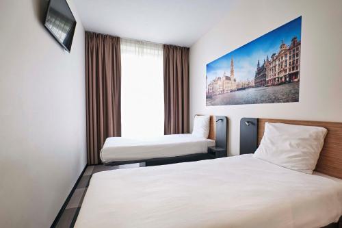 Habitación Doble - 2 camas del hotel Easyhotel Brussels City Centre. Foto 1