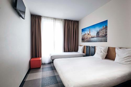 Habitación triple familiar del hotel Easyhotel Brussels City Centre