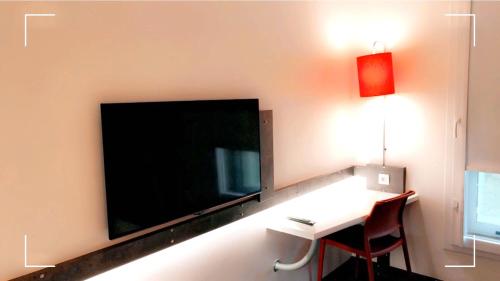 Habitación Familiar del hotel Ibis Budget Aéroport Lyon Saint Exupéry. Foto 1