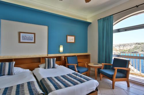 Habitación Doble con vistas al mar - 1 o 2 camas - Orientada al sur del hotel Paradise Bay Resort. Foto 5