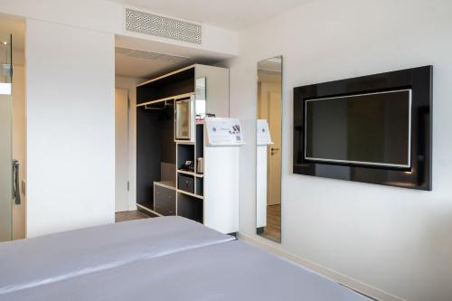 Habitación INNSIDE del hotel Innside By Meliá Aachen. Foto 1