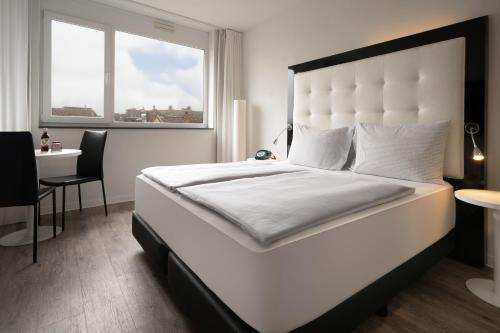 Habitación INNSIDE del hotel Innside By Meliá Aachen. Foto 3