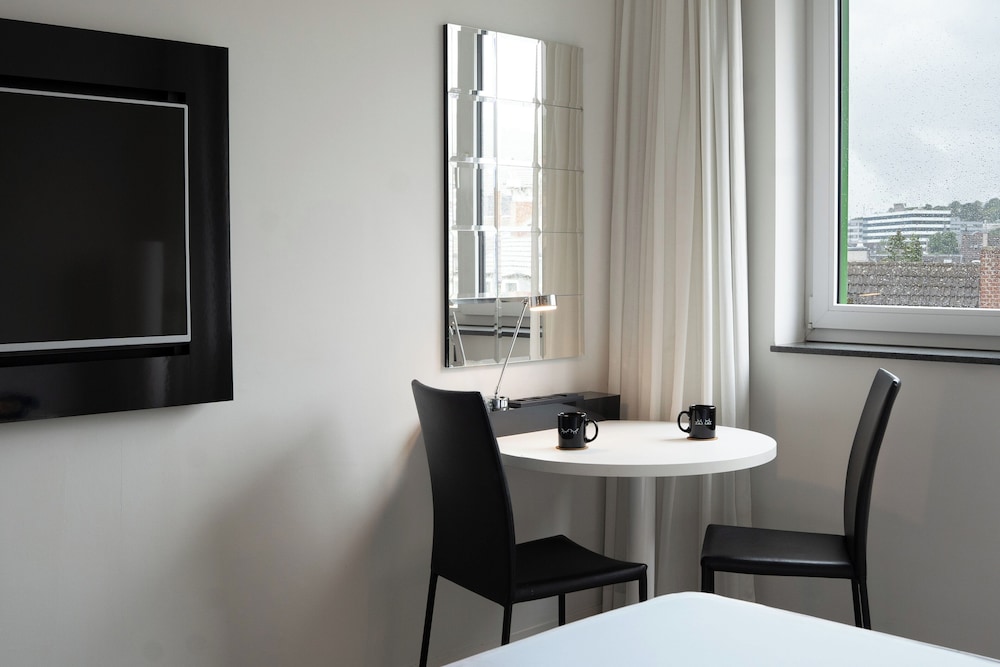 Habitación doble 1 Cama king Con Vistas 2 Camas individuales del hotel Innside By Meliá Aachen. Foto 10
